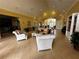 Community clubhouse with seating area and high ceilings at 4000 Santa Maria Dr # 105, Kissimmee, FL 34741