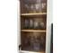 Well-organized cabinet with various glassware at 4000 Santa Maria Dr # 105, Kissimmee, FL 34741