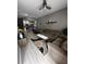 Open living room with modern decor and kitchen view at 4000 Santa Maria Dr # 105, Kissimmee, FL 34741