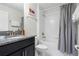 Simple bathroom with tub shower combo and granite vanity at 5431 Solterra Cir, Davenport, FL 33837