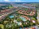 Aerial view showing home location within a community with amenities at 5431 Solterra Cir, Davenport, FL 33837