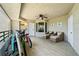 Spacious balcony with seating, ceiling fan, and bike storage at 4631 S Atlantic Ave # 8301, Ponce Inlet, FL 32127