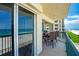 Enjoy ocean views from this balcony with patio furniture at 4631 S Atlantic Ave # 8301, Ponce Inlet, FL 32127