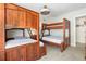 Bedroom with two sets of bunk beds at 4631 S Atlantic Ave # 8301, Ponce Inlet, FL 32127