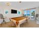 Game room with pool table and ocean views at 4631 S Atlantic Ave # 8301, Ponce Inlet, FL 32127