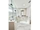 Elegant bathroom with frameless glass shower and granite vanity at 6425 Sw 180Th Cir, Dunnellon, FL 34432