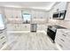 Modern kitchen with stainless steel appliances and ample cabinetry at 6425 Sw 180Th Cir, Dunnellon, FL 34432