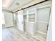 Bright walk-in closet with custom shelving and drawers at 6425 Sw 180Th Cir, Dunnellon, FL 34432