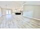 Spacious living room with high ceilings and wood-look flooring at 6425 Sw 180Th Cir, Dunnellon, FL 34432