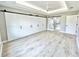 Spacious bedroom with large closet and wood-look floors at 6425 Sw 180Th Cir, Dunnellon, FL 34432