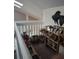 Loft area with a bookshelf and personal items at 2909 Clubview # 2909, Orlando, FL 32822