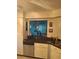Kitchen with stainless steel appliances and ample cabinet space at 2909 Clubview # 2909, Orlando, FL 32822