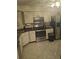 Modern kitchen with stainless steel appliances and corner sink at 2909 Clubview # 2909, Orlando, FL 32822