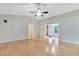 Spacious living area featuring hardwood floors and a ceiling fan at 528 Ridgewood St, Altamonte Springs, FL 32701