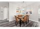 Spacious dining area with a glass-top table and wicker chairs at 8105 Coconut Palm Way # 203, Kissimmee, FL 34747