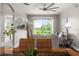 Dining area with a view of the living room and balcony at 8105 Coconut Palm Way # 203, Kissimmee, FL 34747