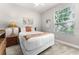 Cozy bedroom with a full-size bed and a tranquil atmosphere at 8105 Coconut Palm Way # 203, Kissimmee, FL 34747
