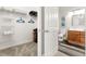 Bathroom with toilet and vanity, near a closet at 8105 Coconut Palm Way # 203, Kissimmee, FL 34747
