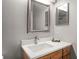 Bathroom with vanity, mirror, and modern fixtures at 8105 Coconut Palm Way # 203, Kissimmee, FL 34747