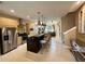 Modern kitchen with island and stainless steel appliances at 3219 Brasilia Ave, Kissimmee, FL 34747