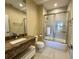 Bathroom with shower/tub combo and granite vanity at 3219 Brasilia Ave, Kissimmee, FL 34747