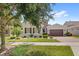 Beautiful two-story home with landscaped yard at 290 Silver Maple Rd, Groveland, FL 34736