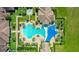 Resort-style pool with a large blue shade structure at 290 Silver Maple Rd, Groveland, FL 34736