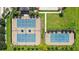 Aerial view of well-maintained tennis courts at 290 Silver Maple Rd, Groveland, FL 34736