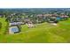 Community amenities: tennis courts, pool, and clubhouse at 290 Silver Maple Rd, Groveland, FL 34736