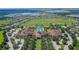 Community clubhouse with pool and tennis courts at 290 Silver Maple Rd, Groveland, FL 34736