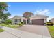 Two-story home with two car garage and curb appeal at 290 Silver Maple Rd, Groveland, FL 34736