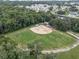 An aerial view of a well-maintained baseball field at 411 Palo Verde Dr, Leesburg, FL 34748