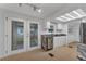 Updated kitchen with granite countertops and wood cabinets at 411 Palo Verde Dr, Leesburg, FL 34748