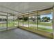 Peaceful screened porch overlooking the community at 411 Palo Verde Dr, Leesburg, FL 34748