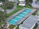 Aerial view of a community's covered shuffleboard courts at 411 Palo Verde Dr, Leesburg, FL 34748