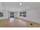 Bright and airy living room with sliding door access to the porch at 411 Palo Verde Dr, Leesburg, FL 34748