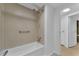 Clean bathroom with a tub and shower at 411 Palo Verde Dr, Leesburg, FL 34748