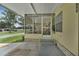 Covered porch with view of the neighborhood at 411 Palo Verde Dr, Leesburg, FL 34748