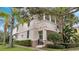 Two-story house with light-colored walls, shutters, and a balcony at 11886 Nautica Dr, Orlando, FL 32827
