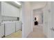 Laundry room with washer, dryer, and cabinets at 11886 Nautica Dr, Orlando, FL 32827