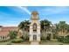 Community center with clock tower and landscaping at 11886 Nautica Dr, Orlando, FL 32827