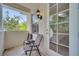 Private balcony with chairs and access through French doors at 11886 Nautica Dr, Orlando, FL 32827