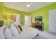 Bright bedroom with a comfy bed, TV, and access to a bathroom at 11886 Nautica Dr, Orlando, FL 32827
