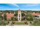 Clock tower and community center with landscaped grounds at 11886 Nautica Dr, Orlando, FL 32827
