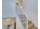 White staircase with carpeted steps leading to the second floor at 11886 Nautica Dr, Orlando, FL 32827