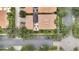 Aerial view of house and surrounding area, showing landscaping and street at 11886 Nautica Dr, Orlando, FL 32827