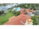 Resort-style pool, clubhouse, and surrounding landscape at 11886 Nautica Dr, Orlando, FL 32827