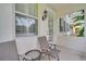 Relaxing patio with seating for two, perfect for enjoying your morning coffee at 11886 Nautica Dr, Orlando, FL 32827