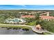 Aerial view of community with pool, clubhouse, and gazebo at 11886 Nautica Dr, Orlando, FL 32827
