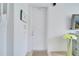 Bright and airy entryway with a modern front door at 11886 Nautica Dr, Orlando, FL 32827